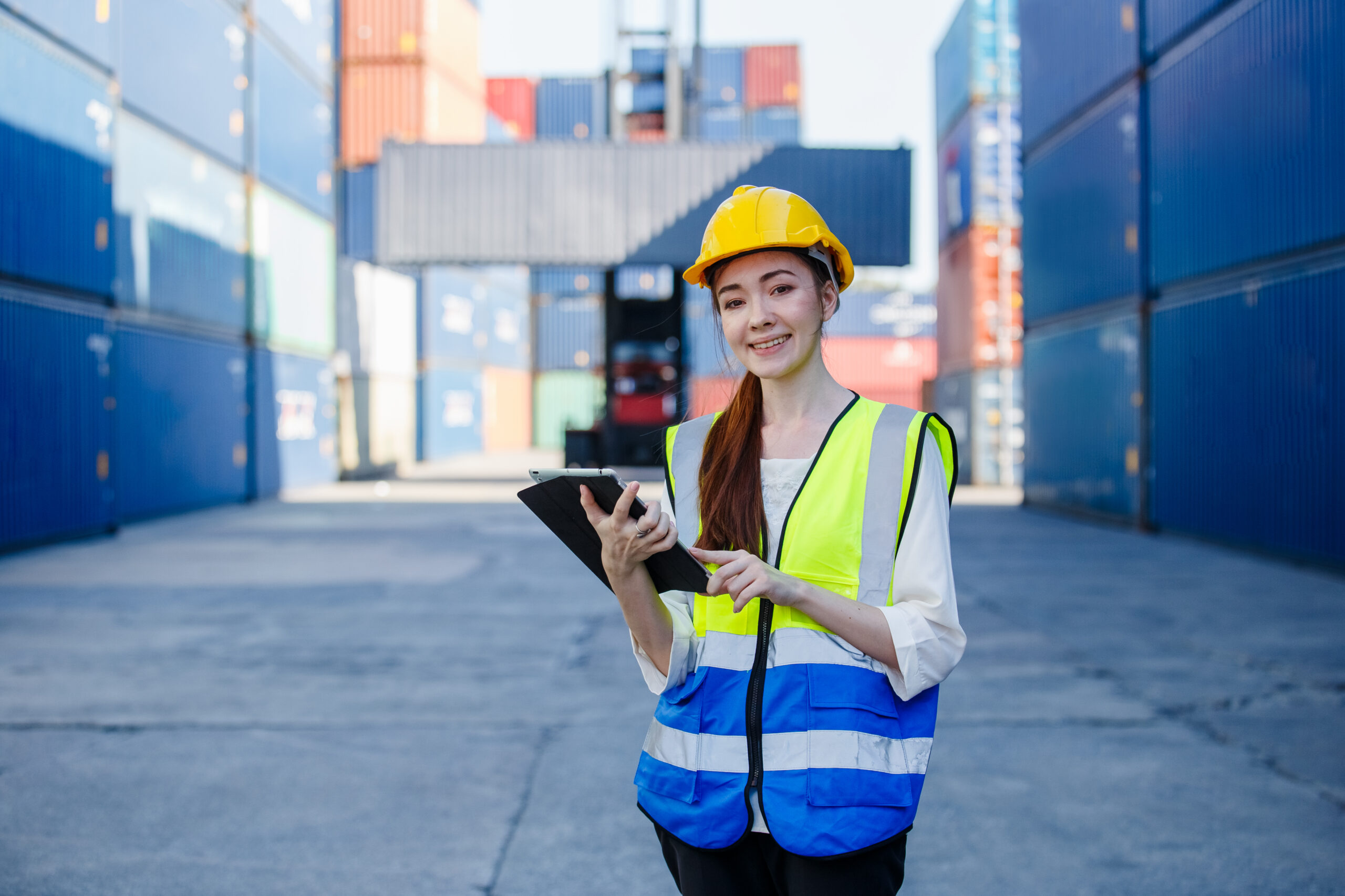 Smiling Beautiful Female Industrial Engineer In Uniform Wearing - Company